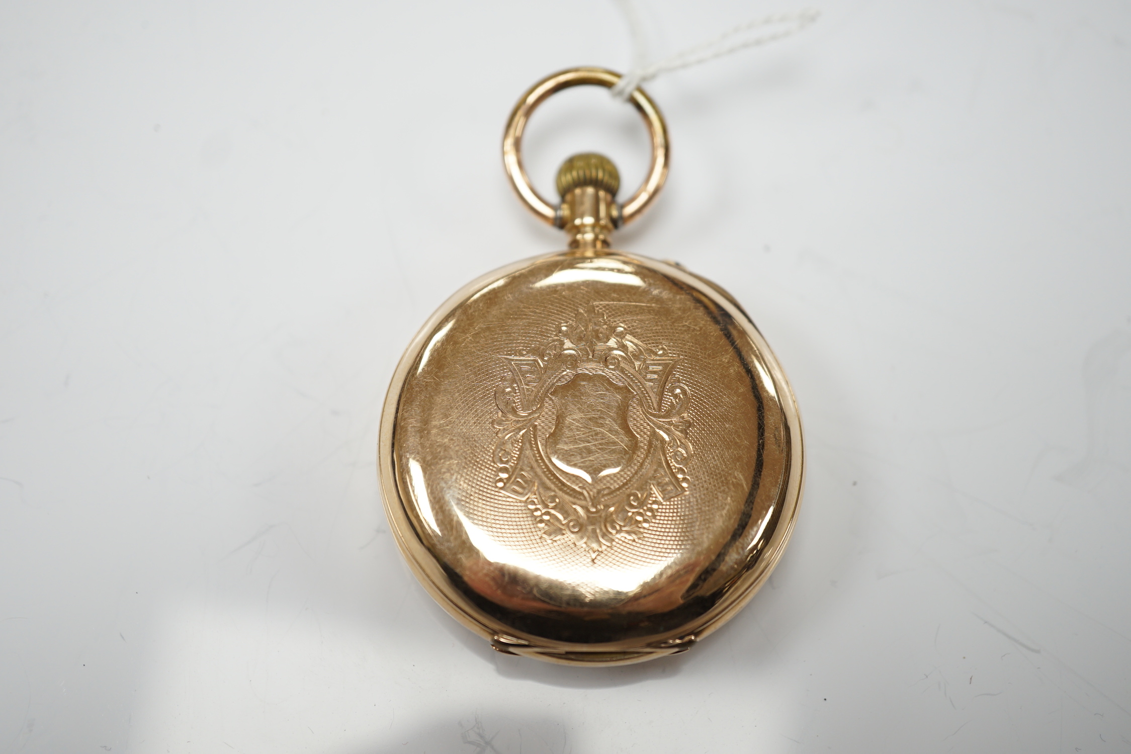 A Swiss 14k open face keyless pocket watch, with Roman dial and subsidiary seconds, case diameter 47mm, gross weight 85.2 grams.